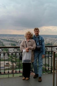 with husband on the Eifel Tower, Paris
